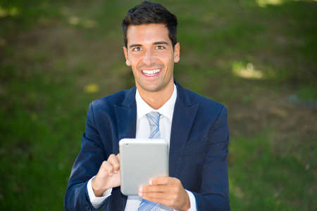 Businessman using his tabletの写真素材