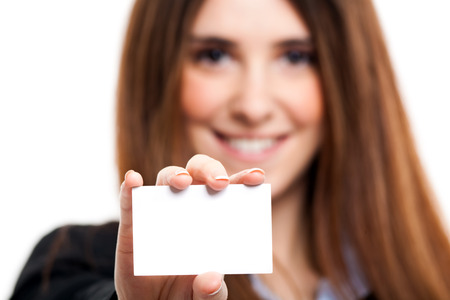 Business woman holding a blank cardの写真素材