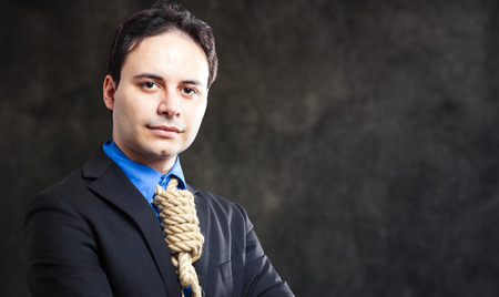 Businessman with a rope in place of a collar, tax pressure concept
