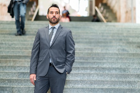 Businessman walking in Milan Central Stationの写真素材