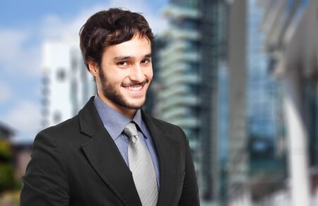 Smiling businessman outdoorの写真素材