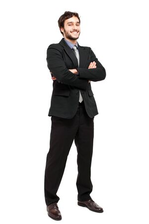 Smiling businessman  full length isolated on whiteの写真素材