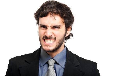 Angry businessman isolated on whiteの写真素材