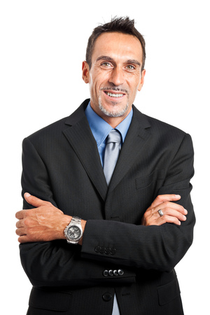 Friendly businessman portrait with folded armsの写真素材