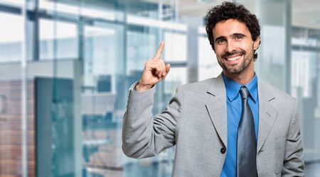 Young businessman having the solutionの写真素材