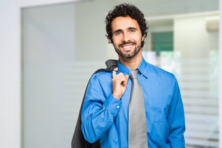 Handsome businessman in the officeの写真素材