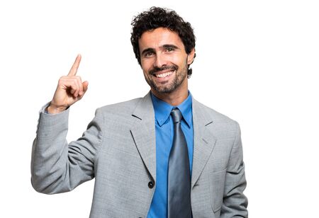 Young businessman having the solutionの写真素材