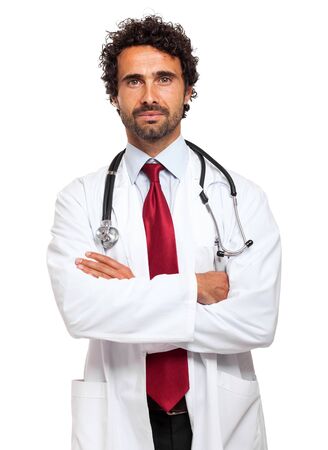 Portrait of a smiling handsome doctorの写真素材