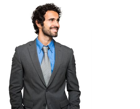 Handsome businessman isolated on whiteの写真素材