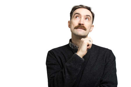 Mature man thinking against a white backgroundの写真素材