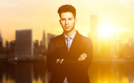 Handsome businessman outdoor at the sunsetの写真素材