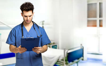 Male nurse isolated on whiteの写真素材