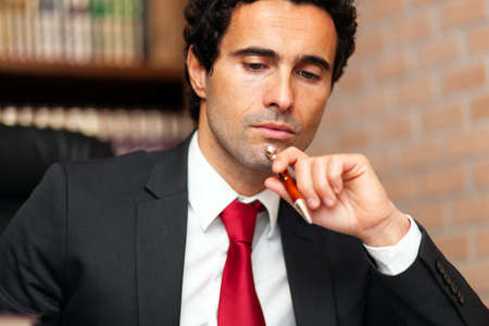 Portrait of a thoughtful lawyer in his studioの写真素材