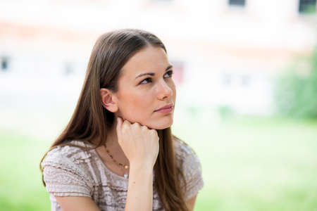 Beautiful woman portrait at the parkの写真素材