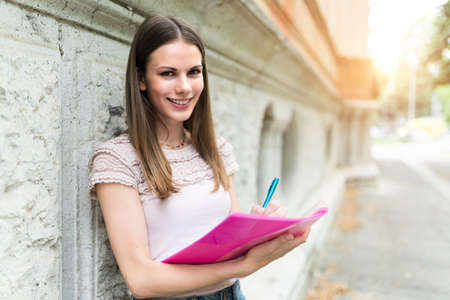 Portrait of a smiling university studentの写真素材