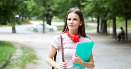 Smiling student outdoorの写真素材