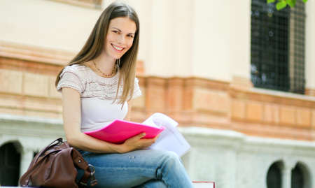 Smiling student outdoorの写真素材