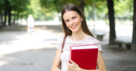 Smiling student outdoorの写真素材