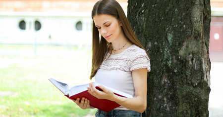 Smiling student outdoorの写真素材