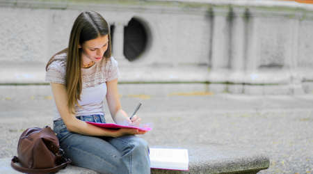 Smiling student outdoorの写真素材