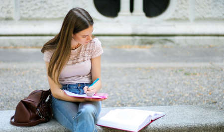 Smiling student outdoorの写真素材