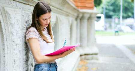 Smiling student outdoorの写真素材