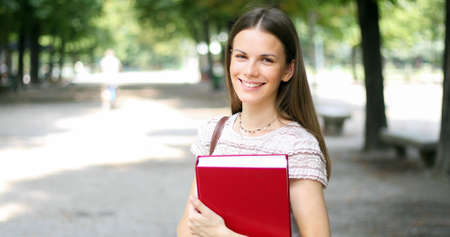 Smiling student outdoorの写真素材