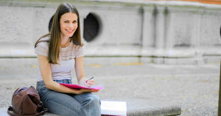 Smiling student outdoorの写真素材