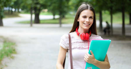 Smiling student outdoorの写真素材
