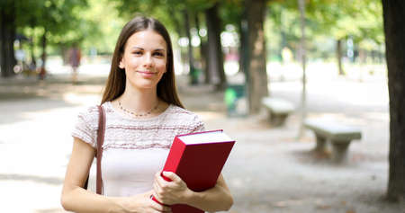 Smiling student outdoorの写真素材
