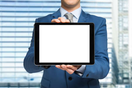Man showing a blank tablet screen