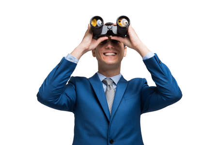 Businessman watching through binoculars in search of new opportunitiesの写真素材