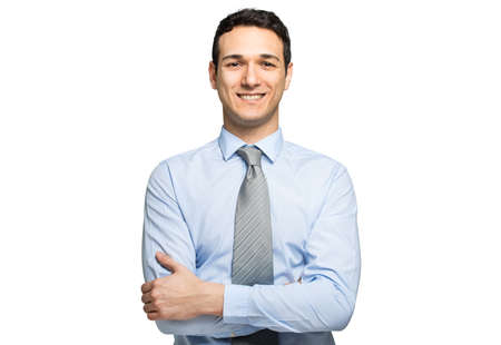 Smiling young manager portrait isolated on whiteの写真素材
