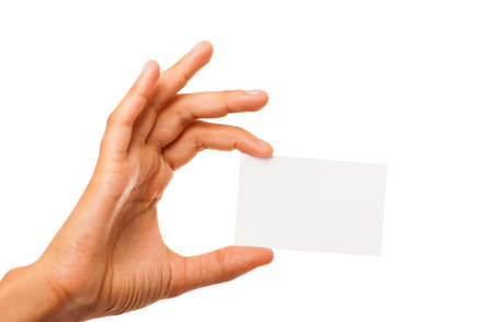 Empty sheet of paper in female hand solated on whiteの写真素材