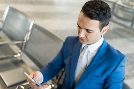 Businessman using his mobile phoneの写真素材
