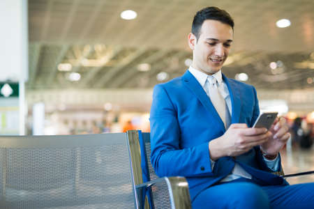 Businessman using his mobile phoneの写真素材