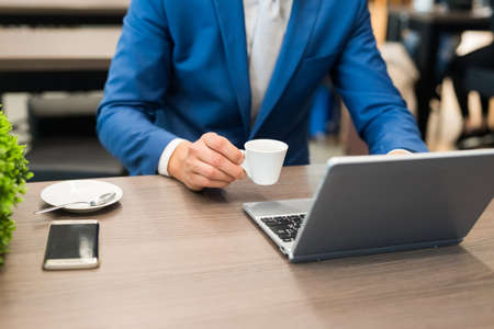 Businessman breakfastの写真素材
