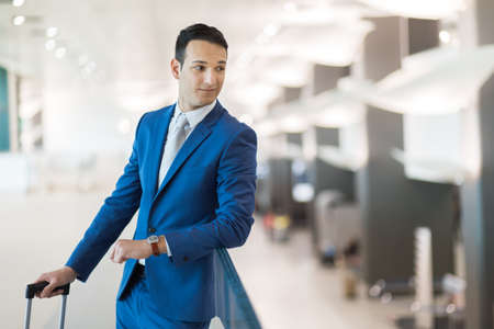 Businessman with trolley bagの写真素材