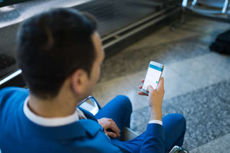 Businessman using his mobile phoneの写真素材
