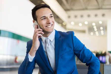 Young manager on the phoneの写真素材