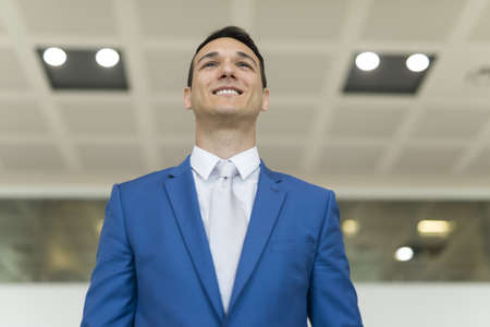 Smiling young businessman portraitの写真素材
