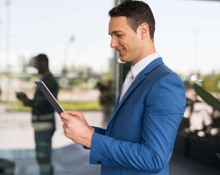 Businessman using his tabletの写真素材