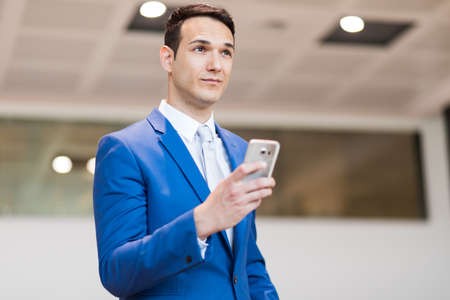 Businessman using on the phoneの写真素材