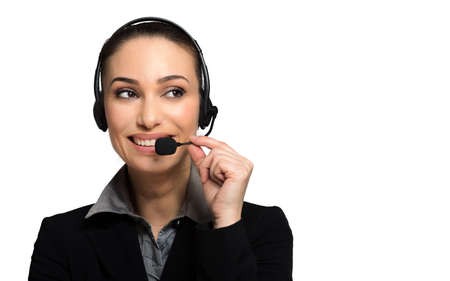 Beautiful consultant of call center in headphones on white backgroundの写真素材