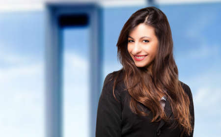 Smiling young female manager portraitの写真素材