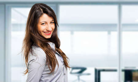 Smiling young female manager portraitの写真素材