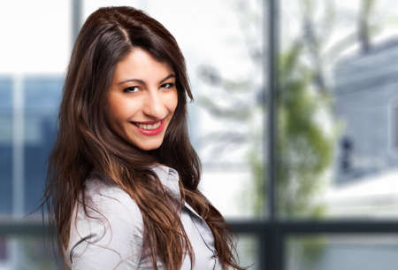 Smiling young female manager portraitの写真素材