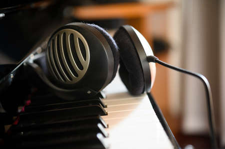 Headphone lying on a digital pianoの写真素材