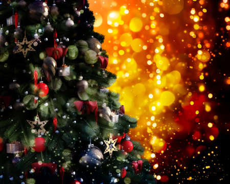 Christmas tree against a glittery luminous backgroundの写真素材
