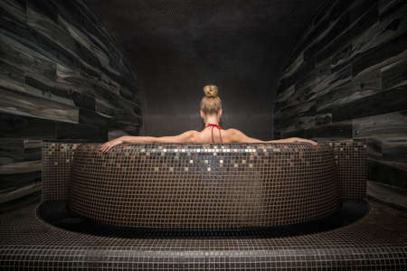 Beautiful woman relaxing in a spaの写真素材